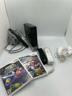 Nintendo RVL-101 Wii Console - (black) with controllers and games bundle